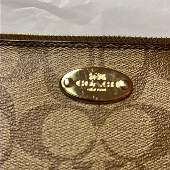 Coach Brown Clutch with Monogram Pattern and Zipper Closure - Picture 2 of 13